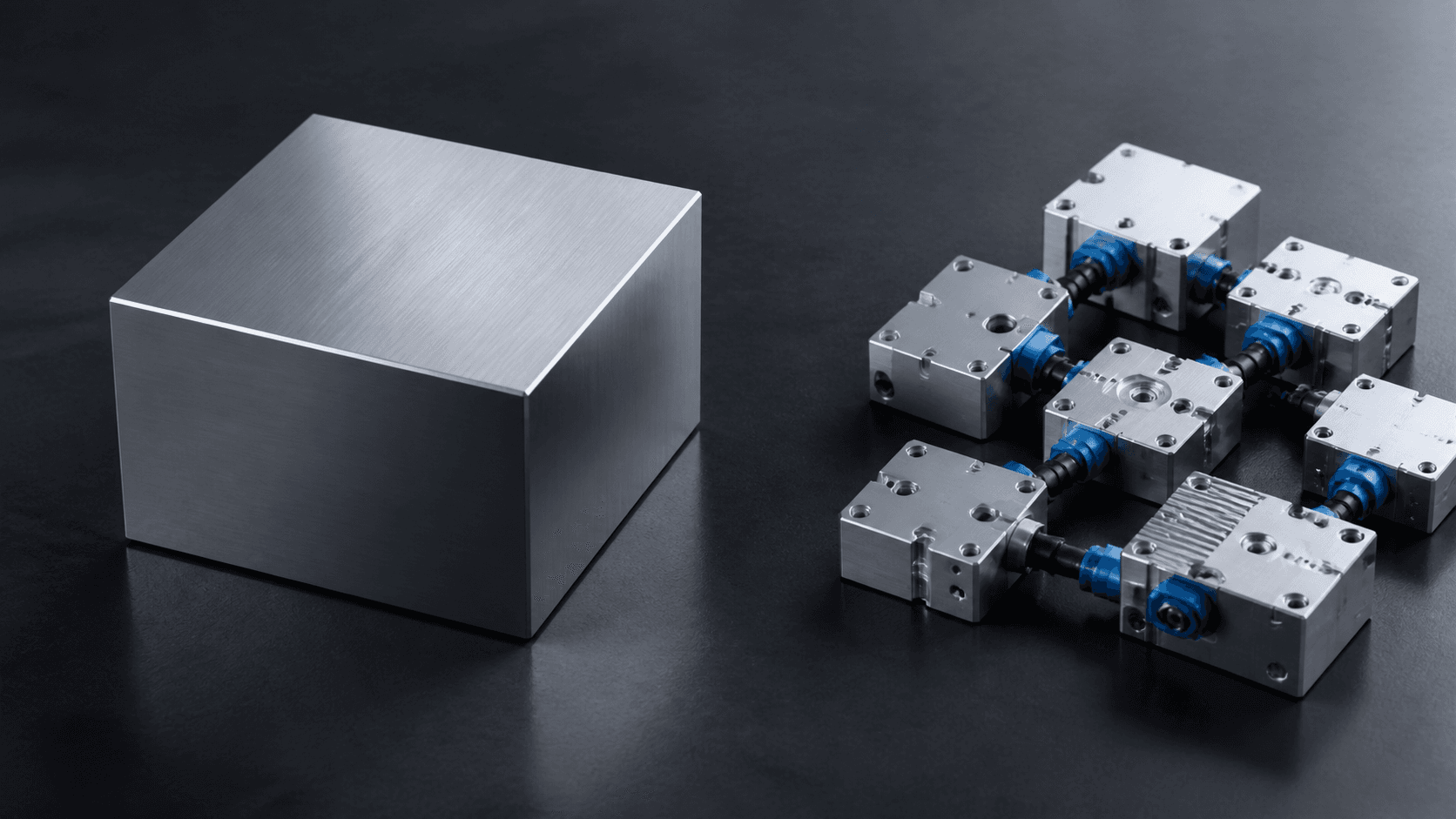 A monolithic block compared with an architecture of connected modules